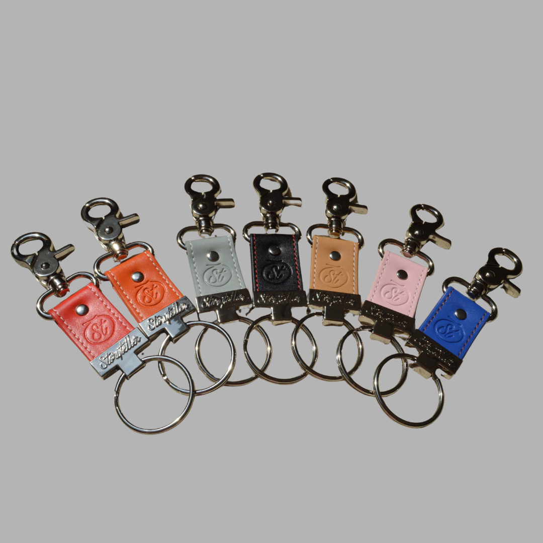 The Storyteller FlagMate® Beige (Limited Edition) | Collectible Keepsake Keyring